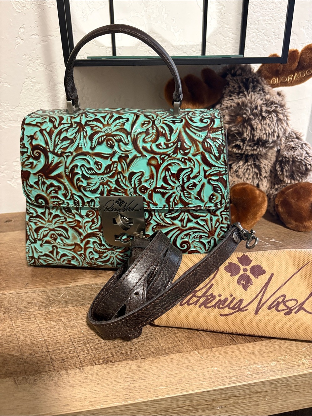 Patricia Nash Turquoise Floral Tooled Leather Crossbody with Brown Accents